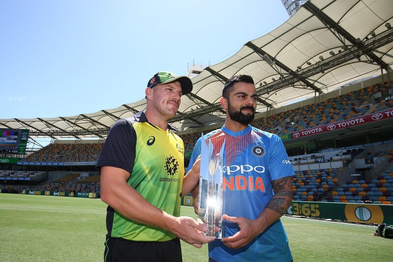 BRISBANE, AUSTRALIA - NOVEMBER 20:  Virat Kohli of India and Aaron Finch of Australia pose during an International Twenty20 series media opportunity at The Gabba on November 20, 2018 in Brisbane, Australia.  (Photo by Chris Hyde/Getty Images)