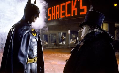 Michael Keaton's Batman faces down Danny DeVito's Penguin in the 1992 film 'Batman Returns'. Photo: Warner Bros