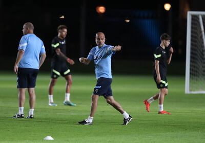 Manchester City manager Pep Guardiola leads training at Emirates Palace. Chris Whiteoak / The National