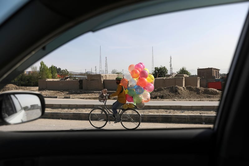 A balloon vendor in Kabul, Afghanistan's capital. AP