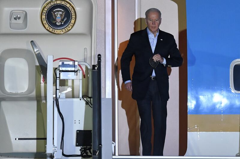 US president Joe Biden steps out of Air Force One, his official plane, as he arrives at Chopin Airport in Warsaw, Poland.  EPA