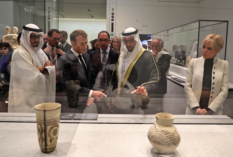 The delegation looks at an installation at Louvre Abu Dhabi.  Ludovic Marin / AFP Photo
