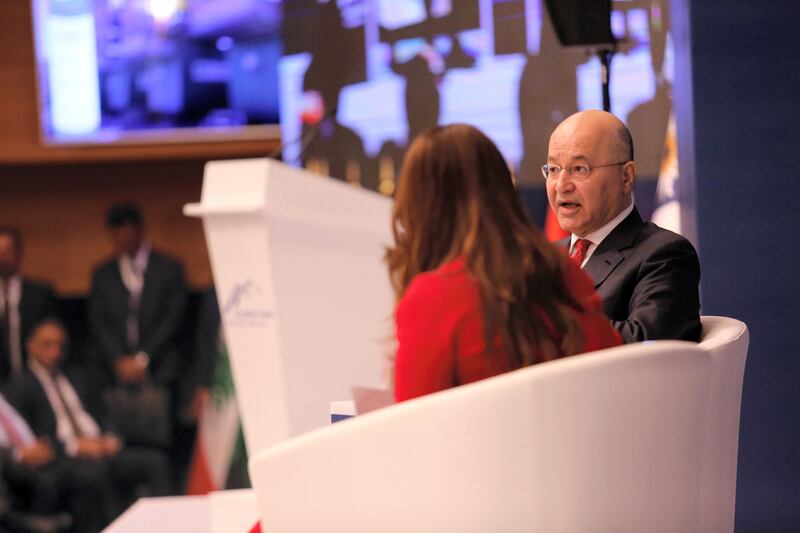 Iraqi President Barham Salih speaks with Mina Al-Oraibi, Editor-in-Chief of The National at the Sulaimani Forum in Sulaymaniyah. Photo courtesy Metrography