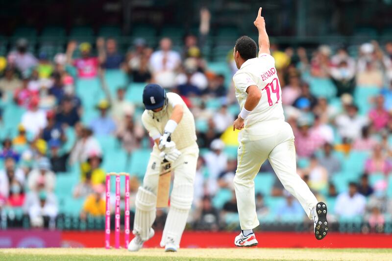 Scott Boland of Australia celebrates after taking the wicket of Joe Root of England on day 5 of the fourth Ashes Test between Australia and England at the Sydney Cricket Ground (SCG), Sydney, Australia, 09 January 2022.   EPA / DAN HIMBRECHTS  EDITORIAL USE ONLY, IMAGES TO BE USED FOR NEWS REPORTING PURPOSES ONLY, NO COMMERCIAL USE WHATSOEVER, NO USE IN BOOKS WITHOUT PRIOR WRITTEN CONSENT FROM AAP AUSTRALIA AND NEW ZEALAND OUT