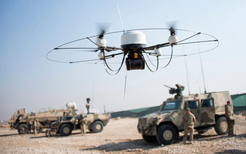 A Mikado drone of the Bundeswehr flies during a show of  German soldiers at Camp Marmal in Mazar-e-Sharif on December 23, 2013.  About 3,000 German troops are deployed in Afghanistan, where the country is the lead nation in the relatively peaceful northern region. AFP PHOTO/JOHANNES EISELE (Photo by JOHANNES EISELE / AFP)