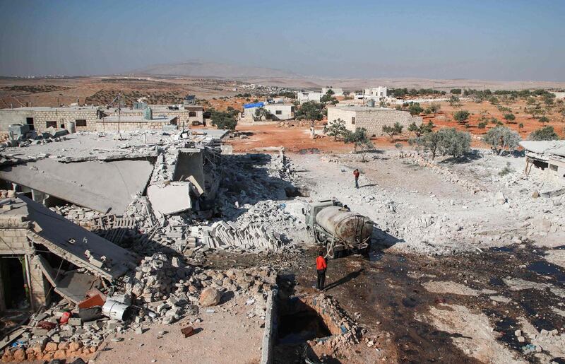 This picture taken shows a view of the aftermath of an airstrike in the Syrian village of al-Sahharah in the countryside west of the northern city of Aleppo. AFP