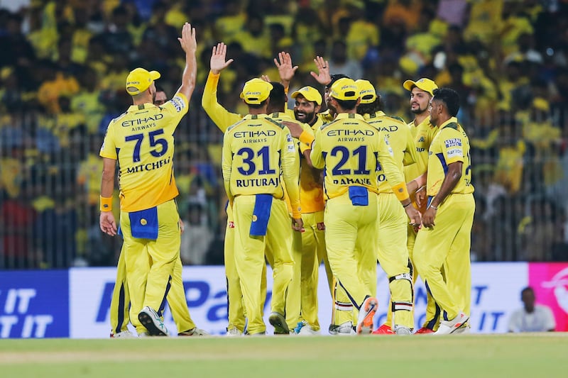 Chennai Super Kings' players celebrate the wicket of Royal Challengers Bengaluru captain Faf du Plessis, caught by Rachin Ravindra off the bowling of Mustafizur Rahman for 35. AP