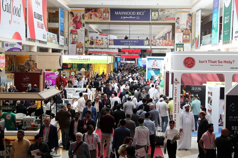 Visitors in one of Gulfood's 24 large halls.