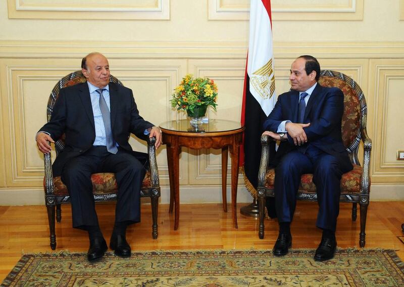 Egyptian president, Abdel Fattah El Sisi (R), is pictured with Abdrabu Mansur Hadi upon the Yemeni president's arrival to attend the 26th Arab Summit in Sharm El Sheikh on March 27, 2015. EPA/Office of the Egyptian President/Handout