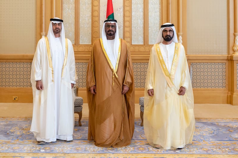 Sheikh Mohammed bin Rashid, Vice President, Prime Minister and Ruler of Dubai, and Sheikh Mohamed bin Zayed, Crown Prince of Abu Dhabi and Deputy Supreme Commander of the Armed Forces, stand for a photograph with Abdullah Al Ketbi, Minister of Federal Supreme Council Affairs.