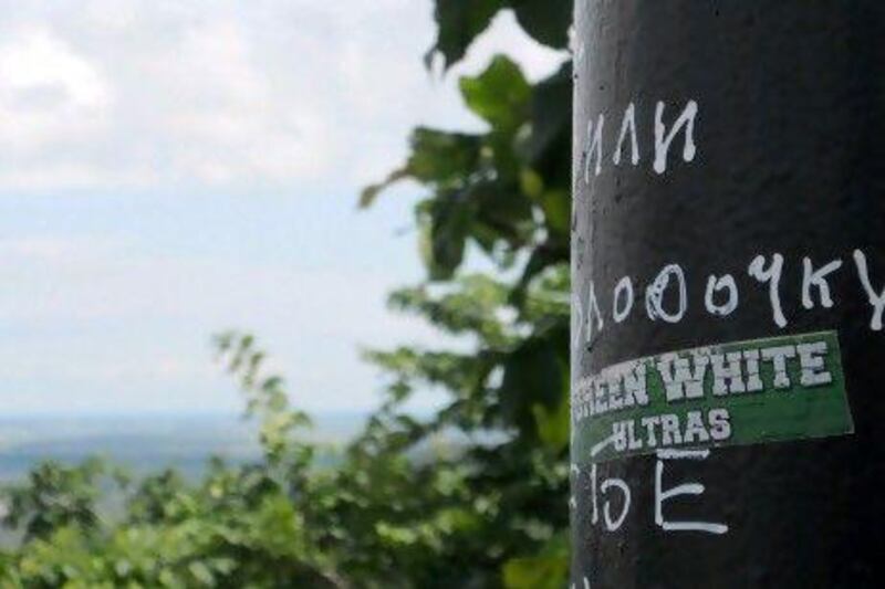 Karpaty Lviv's ultras mark their territory on a lampost at the town's most scenic lookout point.