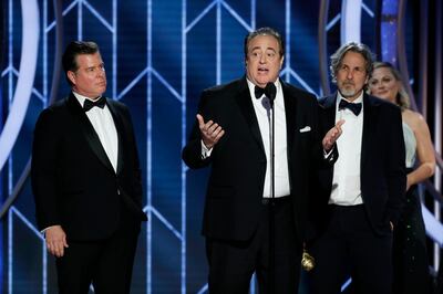 This image released by NBC shows Nick Vallelonga accepting the award for best screenplay for "Green Book" during the 76th Annual Golden Globe Awards at the Beverly Hilton Hotel on Sunday, Jan. 6, 2019, in Beverly Hills, Calif. (Paul Drinkwater/NBC via AP)