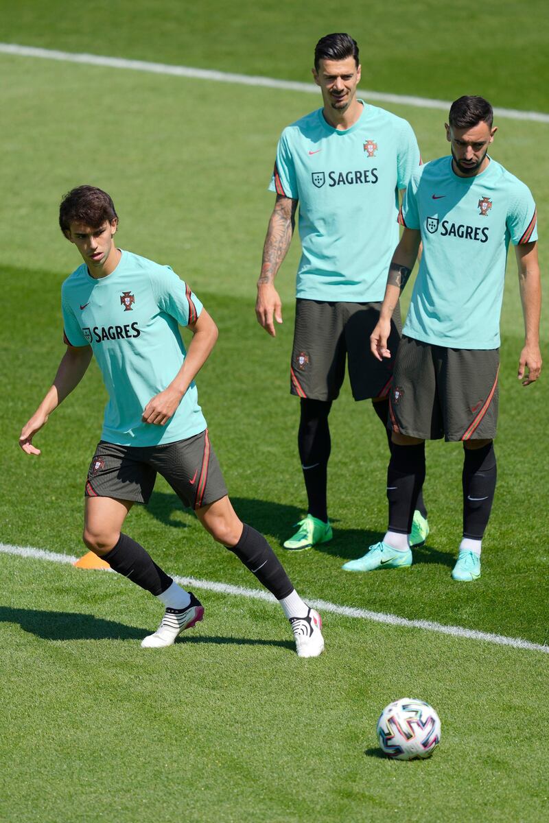 Left to right: Joao Felix, Jose Fonte and Bruno Fernandes. EPA