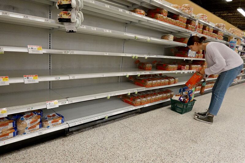 Empty shelves in the bread aisle as residents prepare for Hurricane Ian in St Petersburg, Florida. AFP