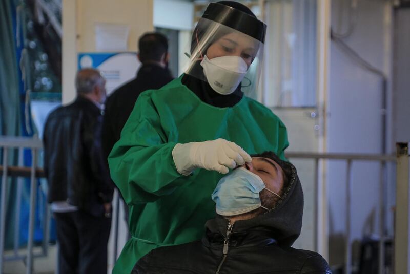 A nurse treating a patient in the Saint-Georges Hospital in the southern suburb of Beirut, Lebanese.  EPA