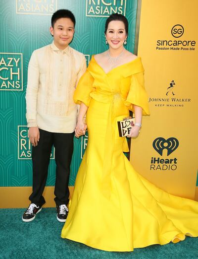 Actress Kris Aquino (R) and her son actor Bimby Aquino Yap attends the premiere of Warner Bros Pictures' "Crazy Rich Asians" in Hollywood, California, on August 7, 2018.  / AFP PHOTO / JEAN-BAPTISTE LACROIX