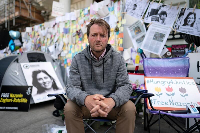 epa07680221 Richard Ratcliffe, the husband of imprisoned Nazanin Zaghari-Ratcliffe poses for a portrait outside the Iranian Embassy in London, Britain, 28 June 2019. Nazanin Zaghari-Ratcliffe has begun a new hunger strike in the Iranian jail. Zaghari-Ratcliffe was jailed for five years in Iran in 2016 after being convicted of spying, which she denies. Mr Ratcliffe is currently on day 14 of his hunger strike in solidarity with his wife.  EPA/WILL OLIVER