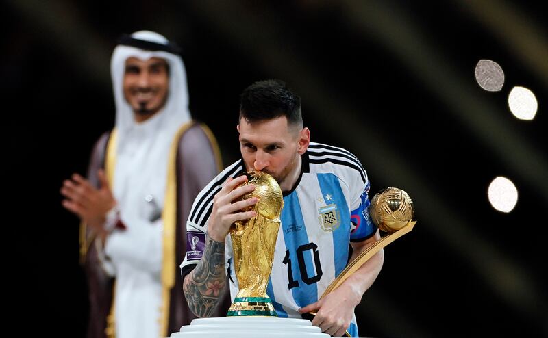 Lionel Messi of Argentina kisses the trophy after beating France 4-2 on penalties. EPA 