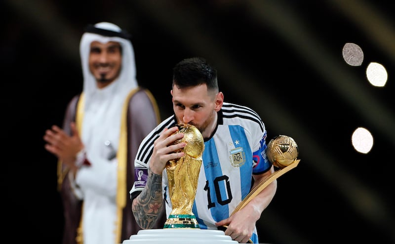 Lionel Messi of Argentina kisses the trophy after beating France 4-2 on penalties. EPA 
