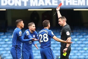 Referee David Coote shows Chelsea's Brazilian defender Thiago Silva (L) the red card against West Bromwich Albion at Stamford Bridge. AFP