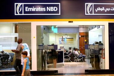 Emirates NBD, the biggest lender by assets in Dubai, reported a 69 per cent drop in its third-quarter profit . Pawan Singh / The National