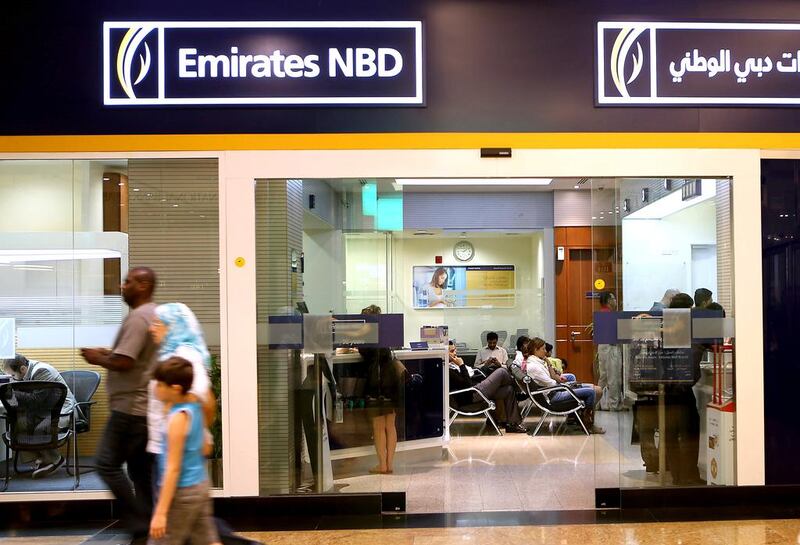 Emirates NBD, the biggest lender by assets in Dubai, reported a 69 per cent drop in its third-quarter profit . Pawan Singh / The National