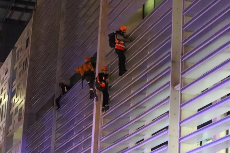 The Animal Rebellion activists climbed the building at about 6am on Tuesday. Photo: Animal Rebellion