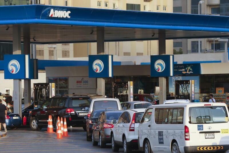 There was a rush on some petrol stations on Friday as drivers filled their tanks before Saturday’s price rise. Hassan Alraisi / Al Ittihad