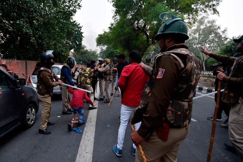 Police clash with demonstrators following a protest against the Indian government's Citizenship Amendment Bill (CAB) in New Delhi on December 15, 2019. AFP / STR