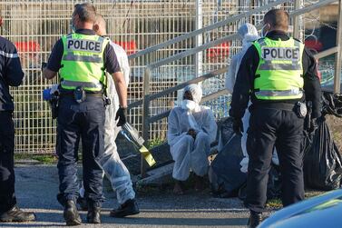 French police in Calais help migrants rescued after their boat got into trouble while trying to reach England. AFP