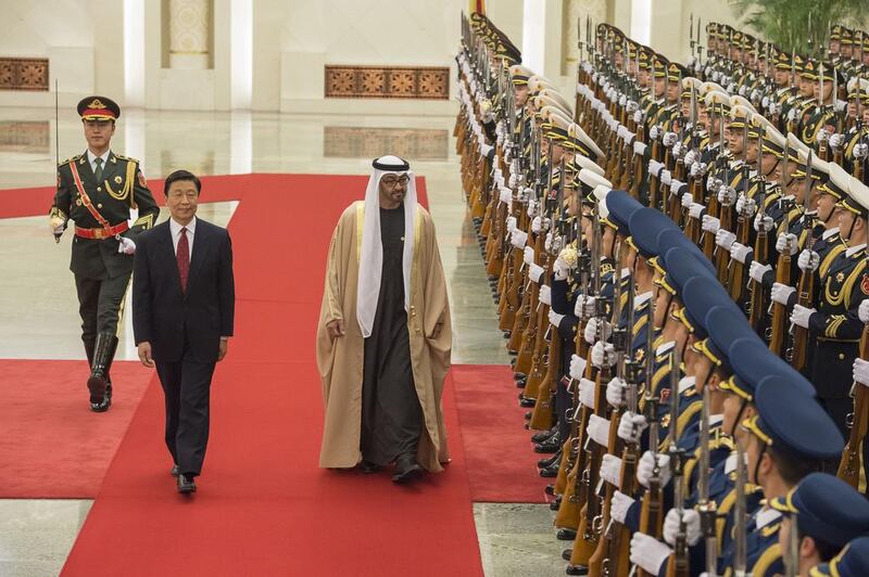 Sheikh Mohammed bin Zayed, Crown Prince of Abu Dhabi and Deputy Supreme Commander of the Armed Forces, inspects the Honour Guard with Li Yuanchao, Vice President of China, at the Great Hall of the People during a state visit to China. Mohamed Al Suwaidi / Crown Prince Court — Abu Dhabi 
