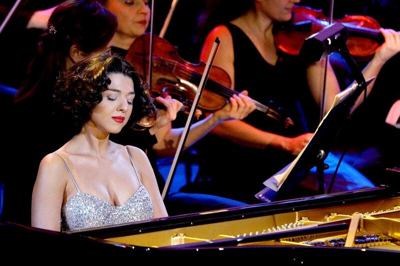 The charismatic Georgian pianist Khatia Buniatishvili is already known for distinctive performances that delight audiences – and sometimes divide critics. Boris Horvat / AFP