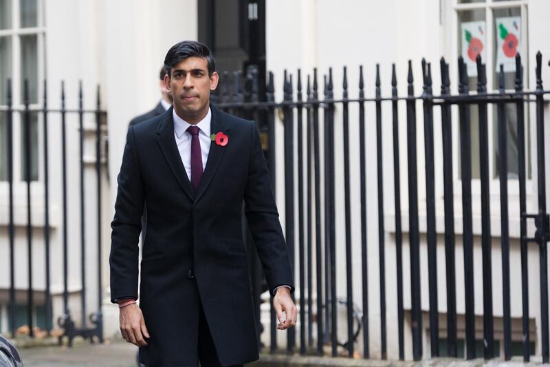 epa08807174 Britain's Chancellor of the Exchequer Rishi Sunak walks through Downing Street to attend the National Service of Remembrance, on Remembrance Sunday, at The Cenotaph in Westminster, London, Britain, 08 November 2020. Remembrance Sunday events are held across the country as the UK remembers and honours those who have sacrificed themselves in two world wars and other conflicts.  EPA/VICKIE FLORES