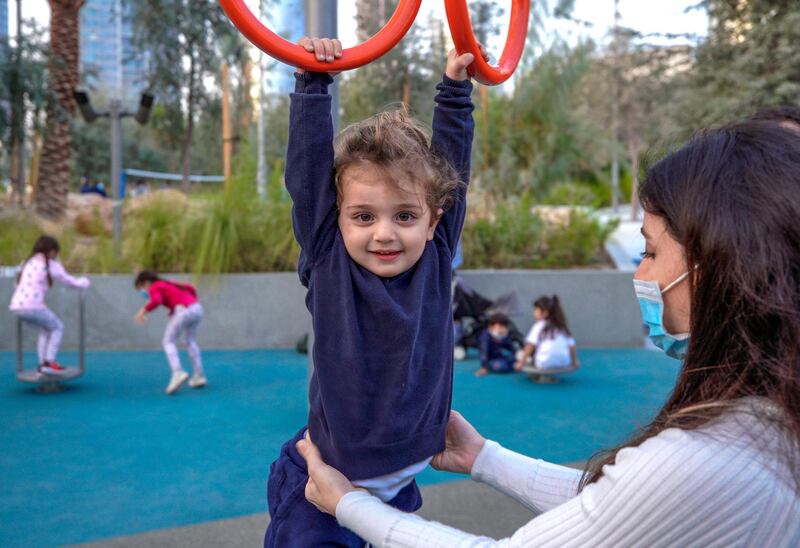 Abu Dhabi, United Arab Emirates, January 21, 2021.  Alex, 2, plays with the rings at Al Fay Park on Reem Island.
Victor Besa/The National 
Section:  LF
Reporter: Panna Munyal