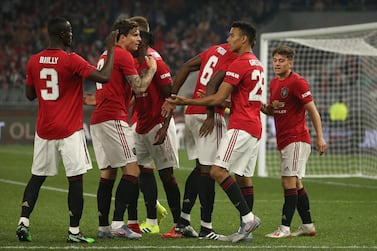 Mason Greenwood, second right, celebrates scoring against Leeds United with his teammates. Getty 