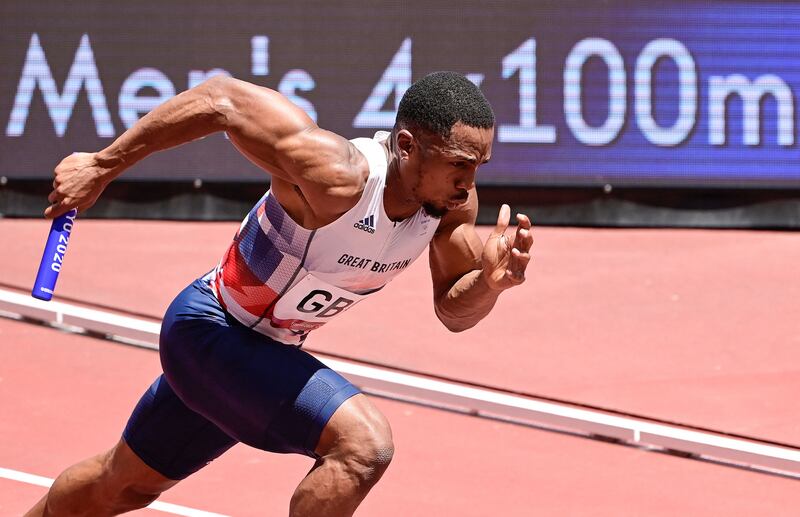 Britain's Chijindu Ujah competes in the men's 4x100m relay heats during the Tokyo 2020 Olympic Games at the Olympic Stadium in Tokyo, on August 5. AFP