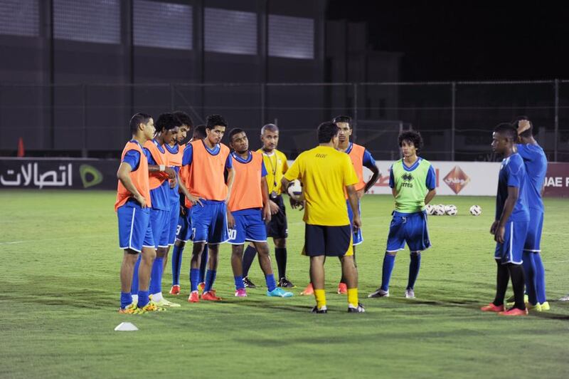 Coach Abdullah Misfir, centre, overseeing training by the UAE Under-19 national team. Courtesy UAE FA