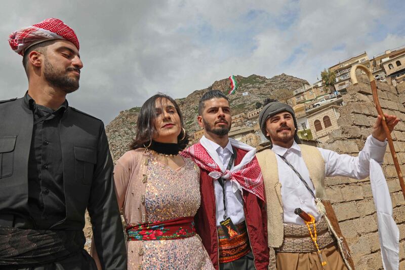 Iraqi Kurds dressed in traditional clothing celebrate Nowruz in Akra, a town about 100 kilometres north of Erbil. AFP