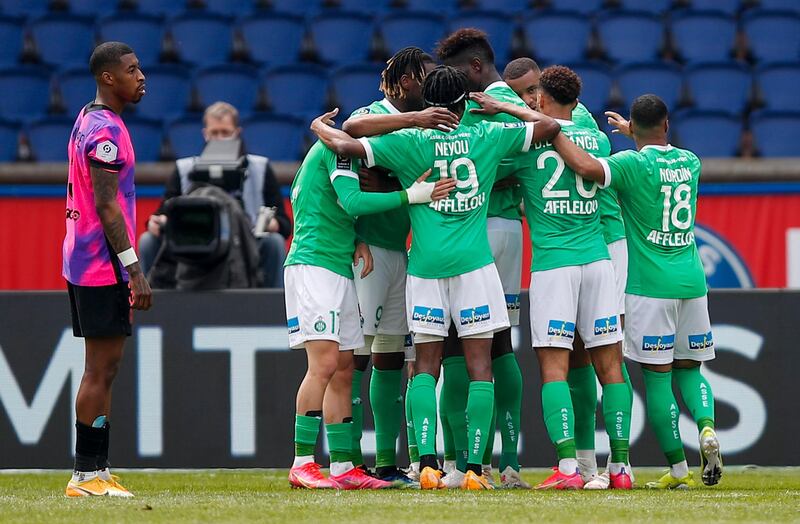 Saint-Etienne's Romain Hamouma is mobbed by teammates after scoring his team's second goal. AP