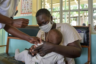 A child gets a malaria vaccination at a hospital in Kenya. Brian Ongoro  /  AFP