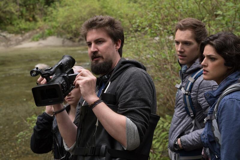 Adam Wingard, left, with James Allen McCune and Callie Hernandez on the set of Blair Witch. Chris Helcermanas-Benge 