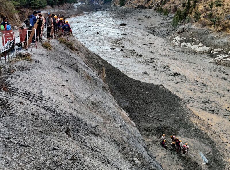 Indo-Tibetan Border Police personnel search for survivors in Chormi village in Tapovan after flash floods swept away a small hydroelectric dam. Reuters
