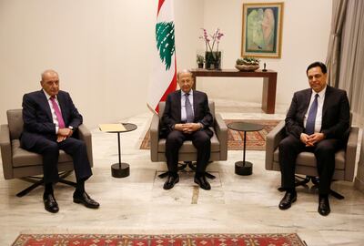 Lebanese President Michel Aoun, center, meets with Lebanese newly-assigned Prime Minister, Hassan Diab, right, and Parliament Speaker Nabih Berri, left, at the presidential palace, in Baabda, east of Beirut, Lebanon, Thursday, Dec. 19, 2019.  Aoun named Diab as prime minister after a day of consultations with lawmakers in which he gained a simple majority of the 128-member parliament. Sixty-nine lawmakers, including the parliamentary bloc of the Shiite Hezbollah and Amal movements as well as lawmakers affiliated with President Michel Aoun gave him their votes. (AP Photo/Hussein Malla)