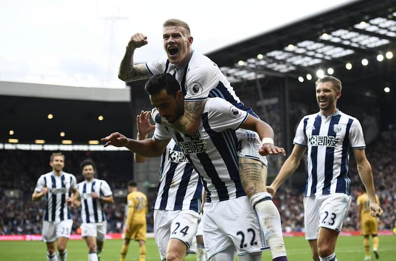 West Bromwich Albion's Nacer Chadli celebrates with James McClean. Dylan Martinez / Reuters