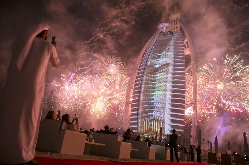 Fireworks light up Burj Al Arab as the hotel staff, guests and visitors celebrate the UAE’s 43rd National Day. Silvia Razgova / The National