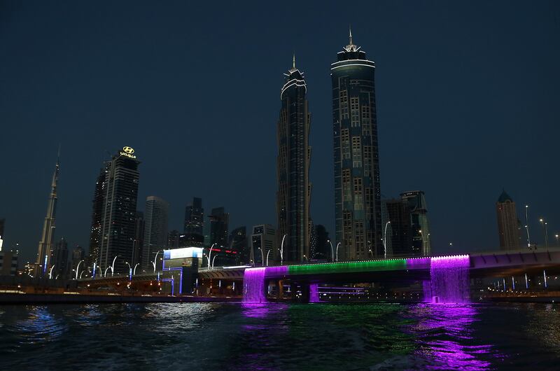DUBAI , UNITED ARAB EMIRATES – May 17 , 2017 : View of the Dubai Skyline from the Abra at Dubai Water Canal in Dubai. The ticket price for one trip is 25 AED per person and the total time of this ride is around 45 minutes. People can see the Burj Khalifa and other buildings from Abra during the ride. ( Pawan Singh / The National ) For News / Photo Feature. ID No :- 18945

 *** Local Caption ***  PS1705- DUBAI CANAL23.jpg