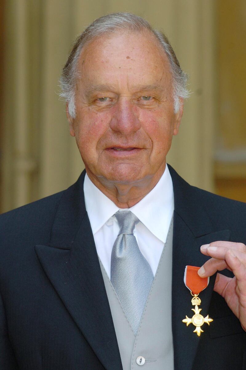 (FILES) In this file photo taken on June 22, 2005, British actor Geoffrey Palmer celebrates becoming an Officer of the Most Excellent Order of the British Empire (OBE) at Buckingham Palace in central London. - Geoffrey Palmer has died at the age of 93, agent confirmed on Friday November 6. (Photo by JOHNNY GREEN / POOL / AFP)