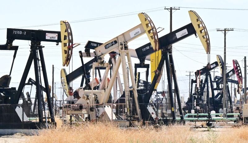 An oilfield in California. The easing of worries on the banking crisis led crude prices to rise on Monday. AFP