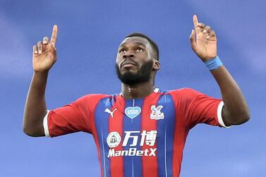 Soccer Football - Premier League - Crystal Palace v Chelsea - Selhurst Park, London, Britain - July 7, 2020 Crystal Palace's Christian Benteke celebrates scoring their second goal, as play resumes behind closed doors following the outbreak of the coronavirus disease (COVID-19) REUTERS / Peter Cziborra / Pool EDITORIAL USE ONLY. No use with unauthorized audio, video, data, fixture lists, club/league logos or "live" services. Online in-match use limited to 75 images, no video emulation. No use in betting, games or single club/league/player publications. Please contact your account representative for further details.