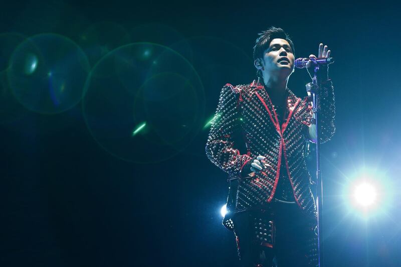 SINGAPORE - SEPTEMBER 14:  Jay Chou performs on stage during day one of the 2018 Singapore Formula One Grand Prix at Marina Bay Street Circuit on September 14, 2018 in Singapore.  (Photo by Suhaimi Abdullah/Getty Images)